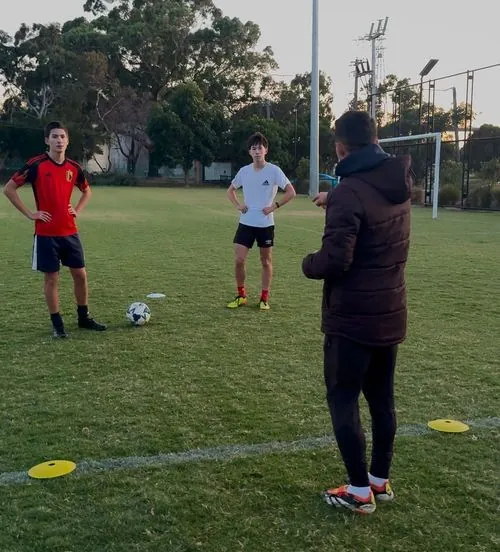 Coach Chris working with players during a structured training session